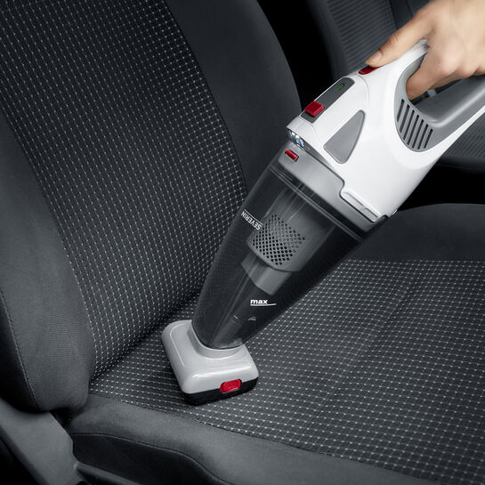 На картинке можно увидеть аккумуляторный ручной пылесос.